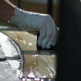spreading epoxy on a core